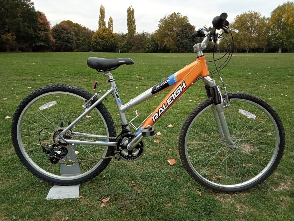 raleigh devotion, orange silver, 17 f 26 w, 3x7 gears