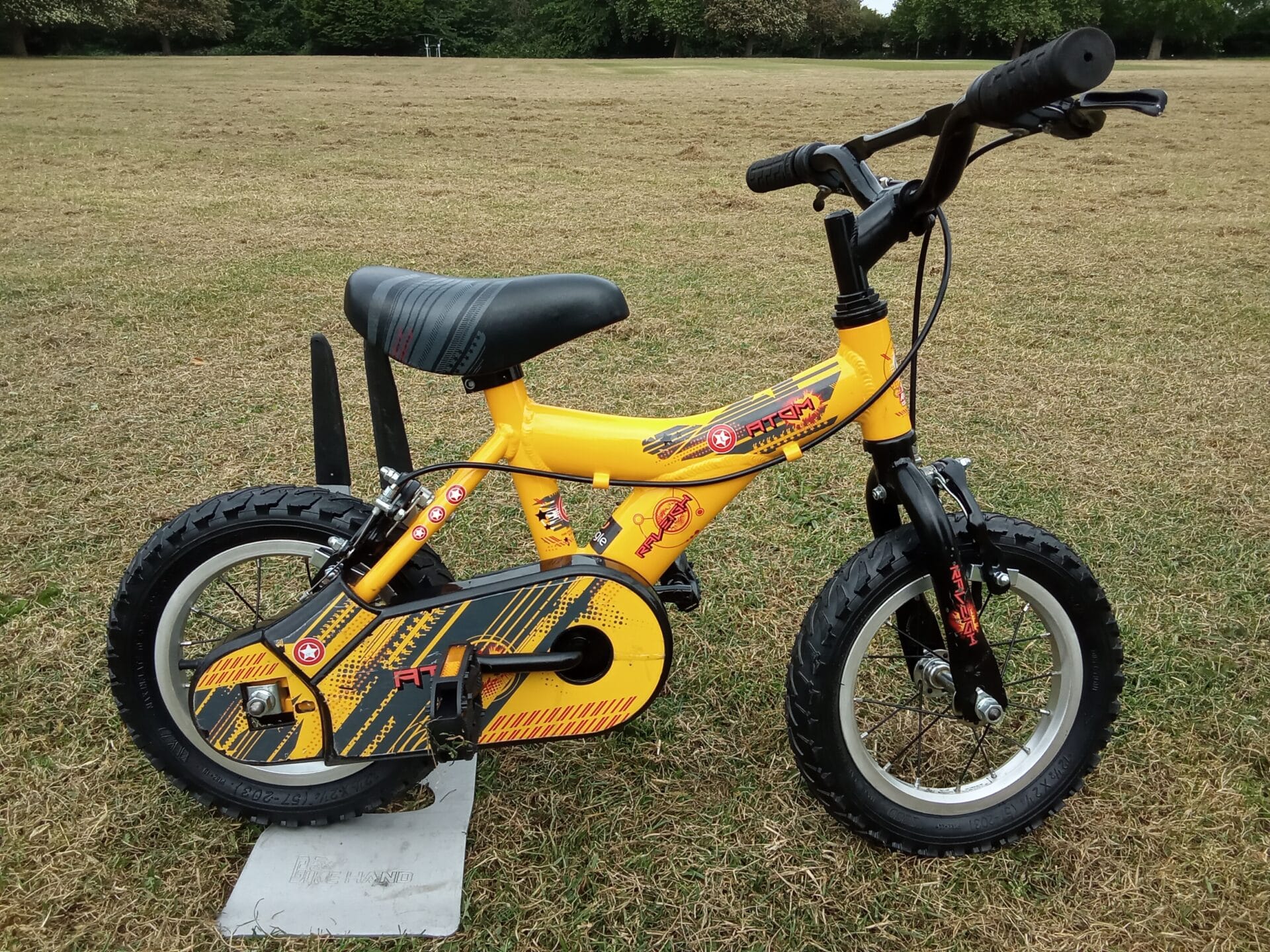 raleigh atom, 12.5 wheel, yellow