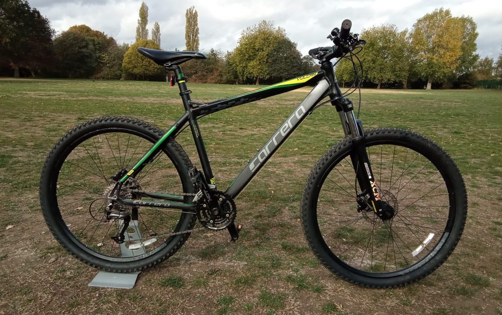 carrera vulcan, 20 frame, 27.5 wheel, 3 x 9 gears, black and green